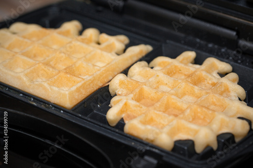  waffles are cooked in waffle iron