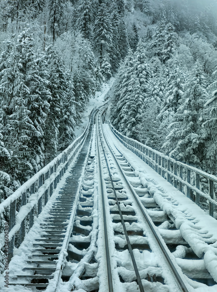 Funicular railway in the Swiss Alps in winter Funicular railway in the Swiss Alps in winter