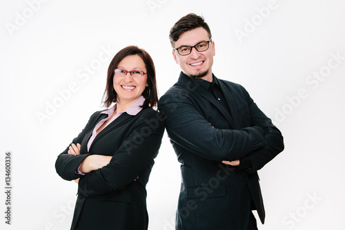 Couple of cute business partners on white background