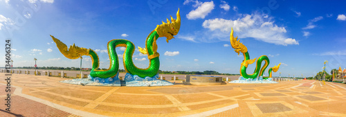 Amazing Naga Sculpture at Mekong Riverside nearby Walking Street in Nongkhai, Thailand. Naga is a very great snake, specifically the king cobra, found in the Indian religions of Hinduism and Buddhism. photo