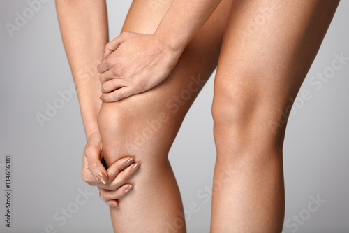 Body Pain. Close-up Of Beautiful Female Body With Pain In Knees