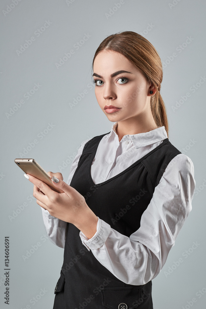 Pretty young business woman using mobile phone indoor Pretty young business woman using mobile phone indoor
