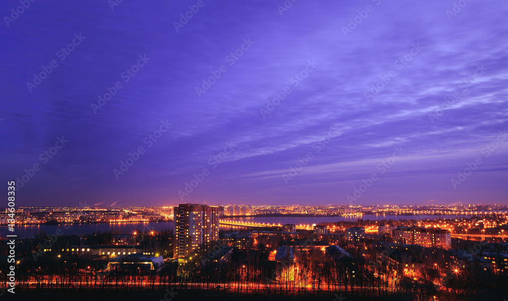 Fototapeta premium Night cityscape view of Voronezh city from rooftop. District Birchwood 