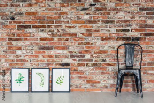 Leaves paintings and black chair