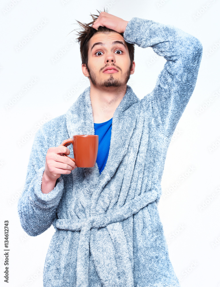 handsome bearded man with cup in terry bathrobe handsome bearded man with cup in terry bathrobe
