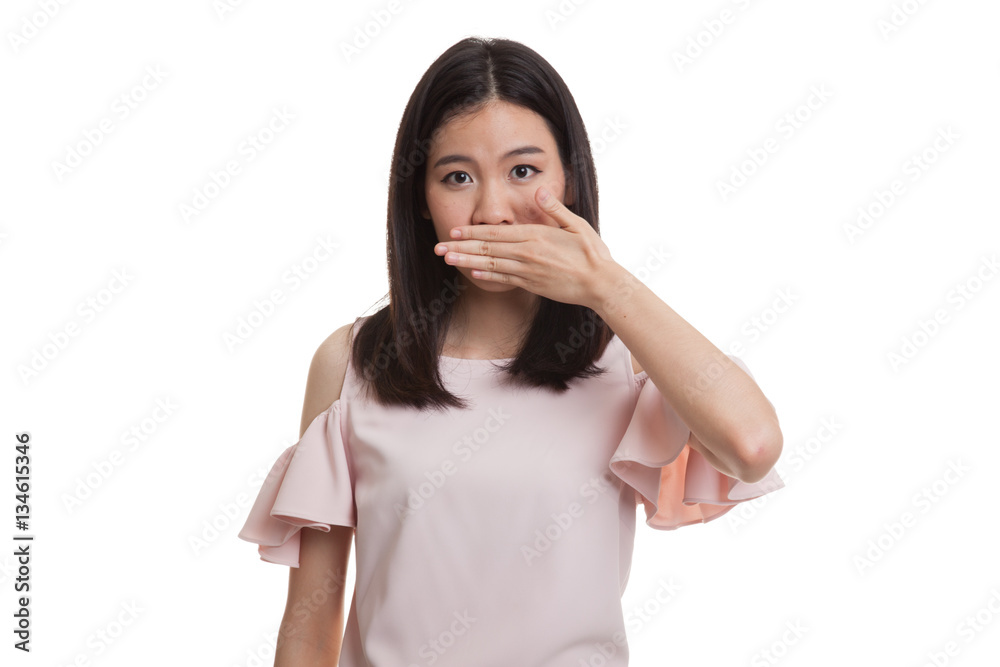 Young Asian business woman close her mouth with hand. Young Asian business woman close her mouth with hand.