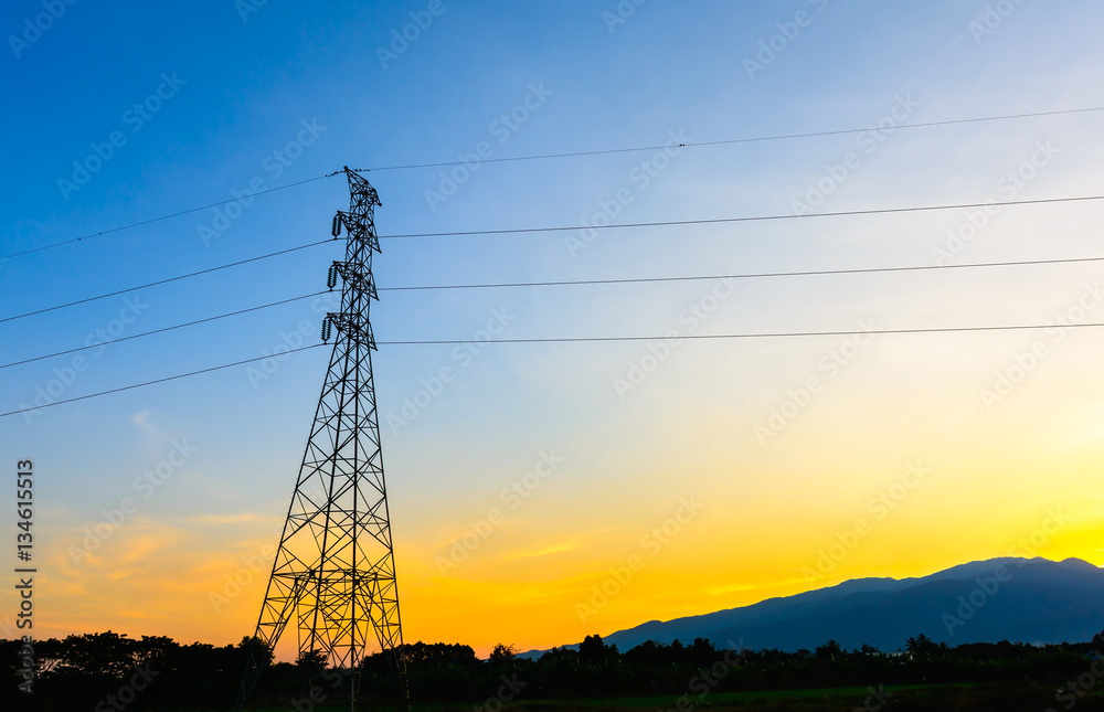 Fototapeta premium high voltage post,Electricity pylons and lines at sunset.