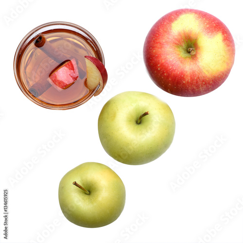 apple tea or mulled wine with cinnamon isolated on white