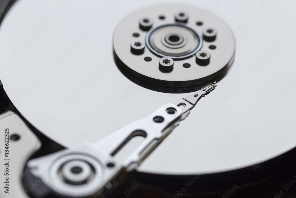 Close ups of an open computer hard drive Close ups of an open computer hard drive