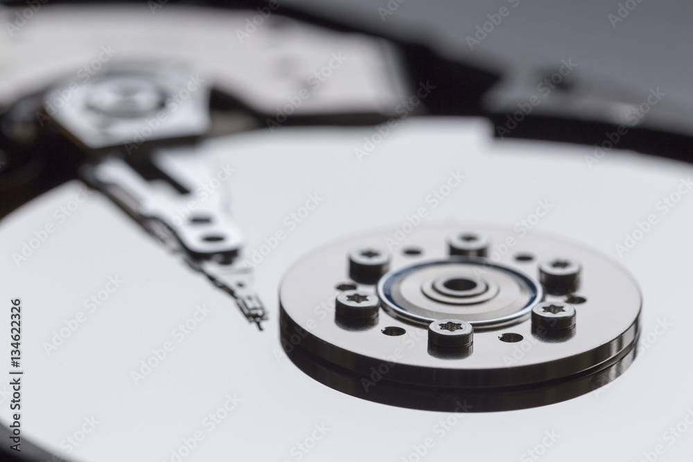 Close ups of an open computer hard drive Close ups of an open computer hard drive