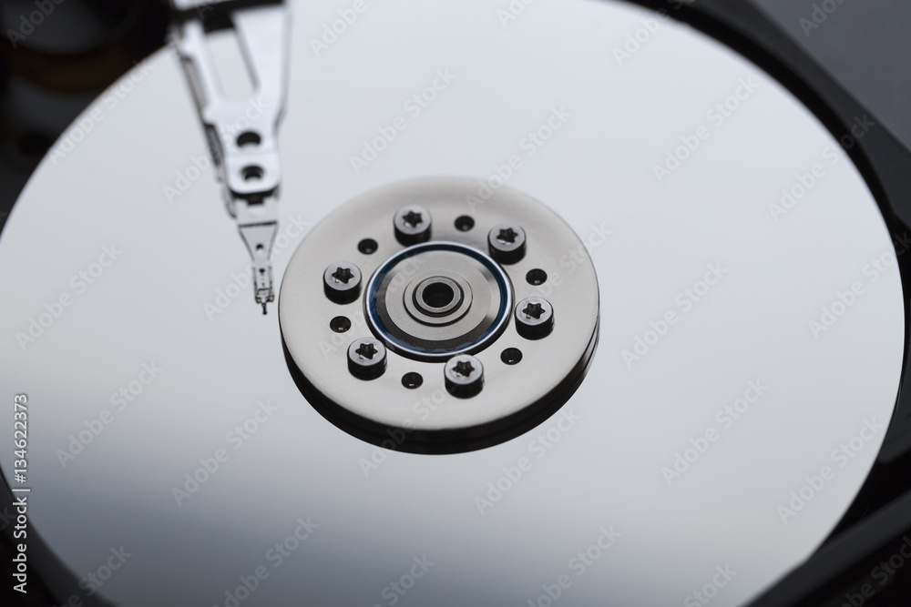 Close ups of an open computer hard drive Close ups of an open computer hard drive