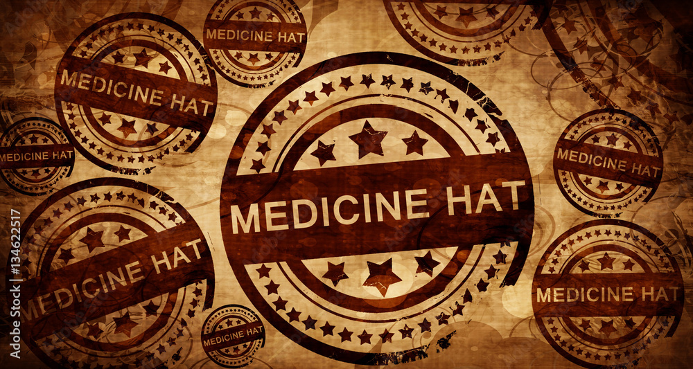 Medicine hat, vintage stamp on paper background