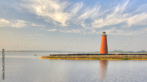 Small Red Lighthouse on Lake Tohopekaliga in Kissimmee, Florida.  photo
