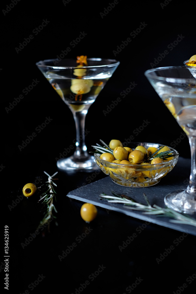 Margarita cocktail alcohol drink in glass with green olives Margarita cocktail alcohol drink in glass with green olives