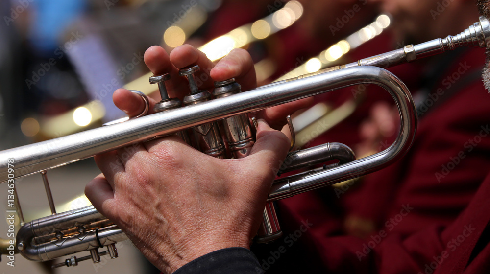 Obraz premium trumpet player during an outdoor concert of a brass band