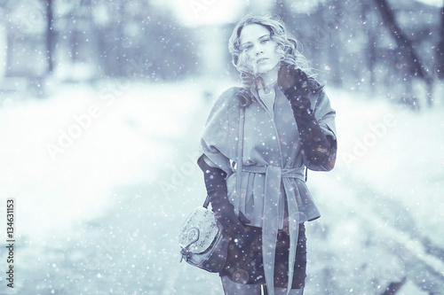 Girl outside in snow winter coat