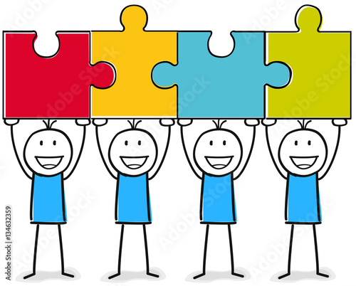 Team aus Figuren mit Puzzle Stücke im Teamwork 
