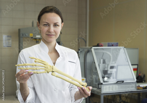 girl holding a fake hand
