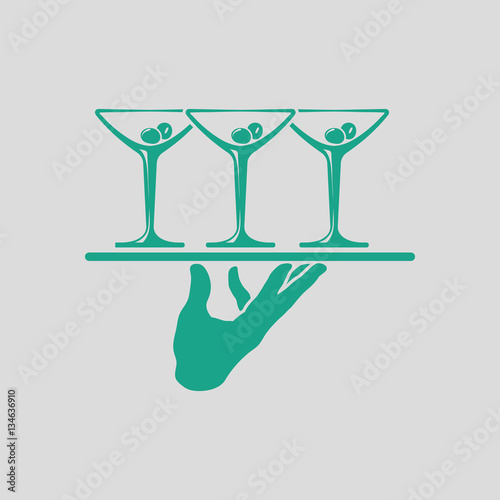 Waiter hand holding tray with martini glasses icon