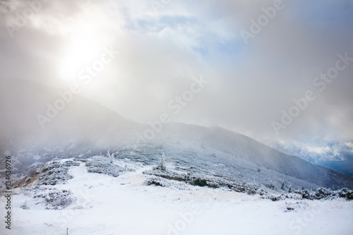 Winter mountains in a fog.