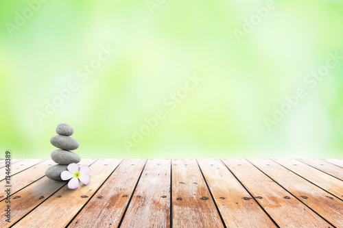 Canvas Print zen stones and Plumeria  on wooden in the garden. Concept relaxa
