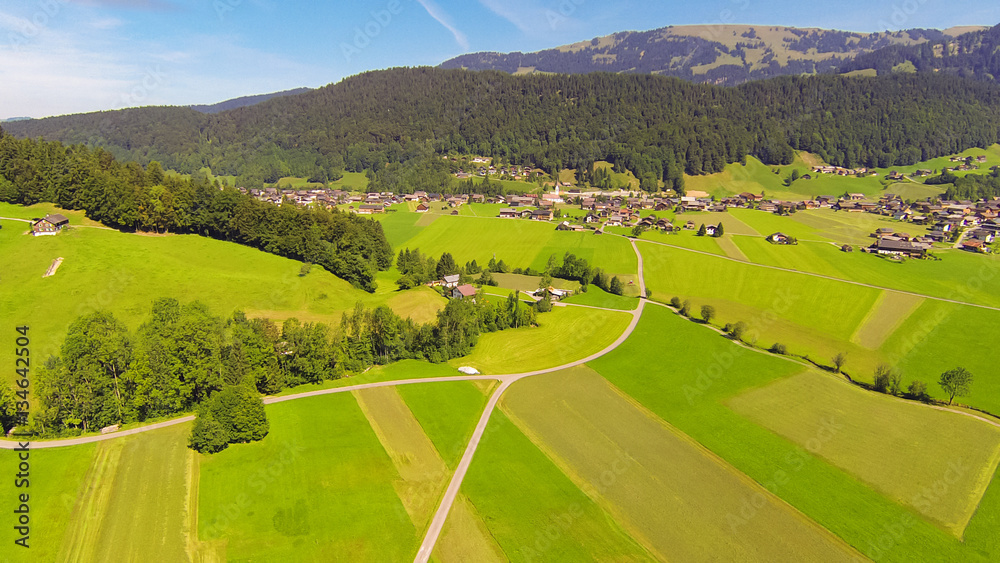 Aerial View Of A Village In The Austrian Alps