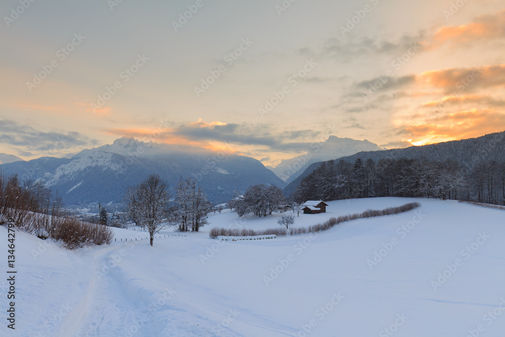 Sunset at winter landscape with Mountain Watzman in Bavaria