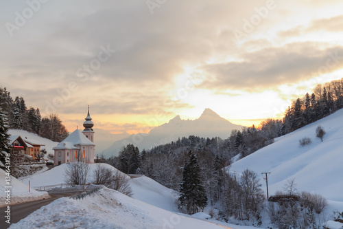 Sunset at Maria Gern Berchtesgaden, Bavaria with Watzman in winter with snow and clouds