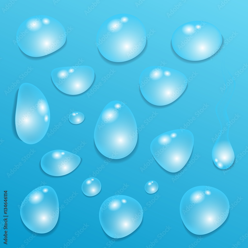 Set of  transparent  drops of pure clear water isolated on a blu