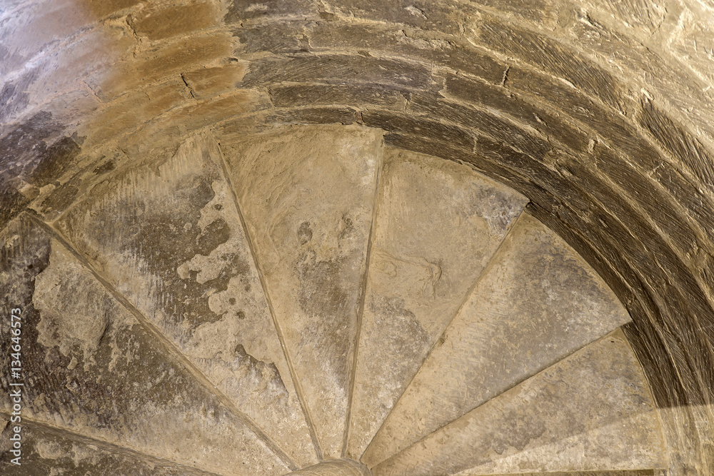 Medieval carved stone snail staircase hand carved. Bell tower on the church Late Gothic building of San Esteban de la Huerta built in the village of Loarre Aragon Huesca Spain. Top view