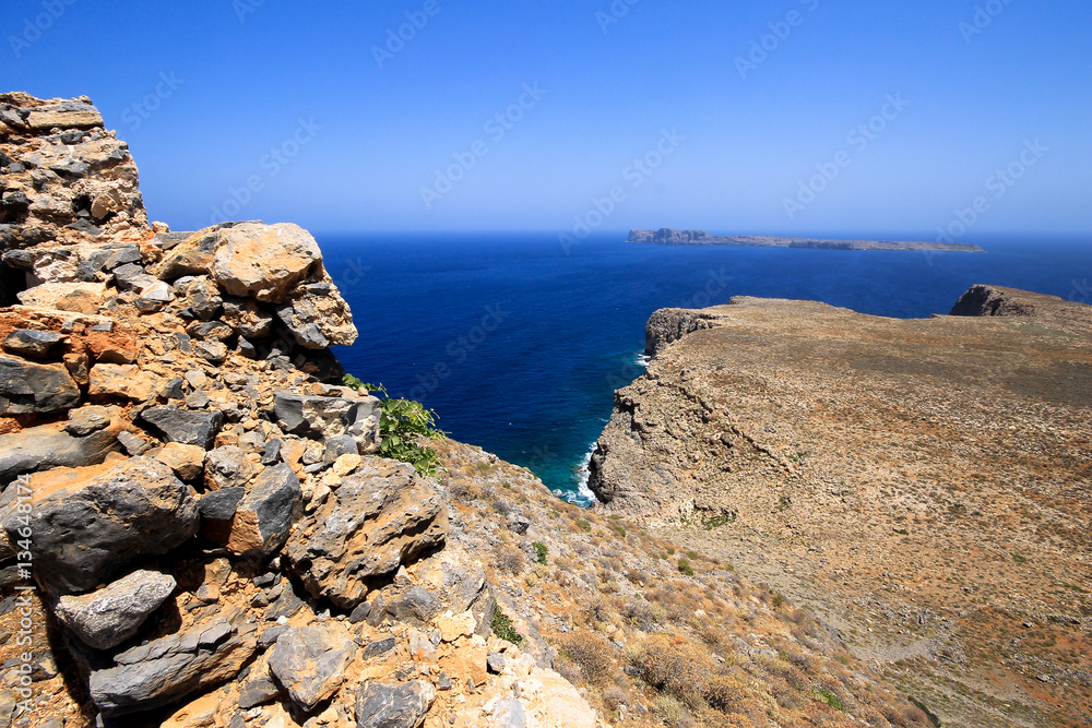 Coastal Greece, picture of the rocky coast of Greece , with blue skies and clear waters