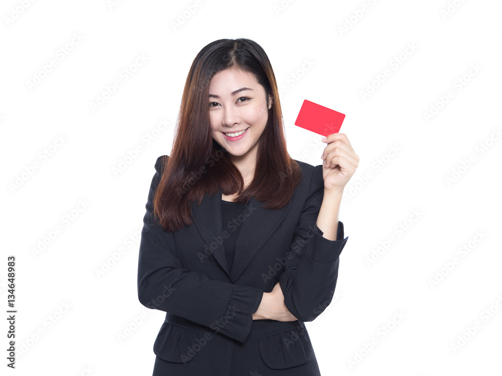 Young business woman smiling and holding red card in hand isolated on white background, samrt card concept Young business woman smiling and holding red card in hand isolated on white background, samrt card concept