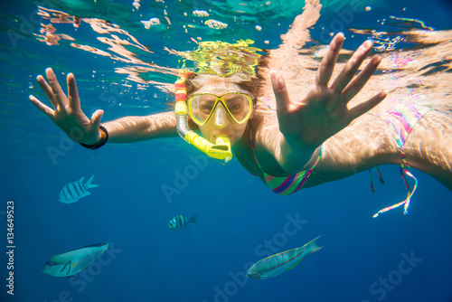 girl engaged in snorkeling in the Red Sea in Egypt
