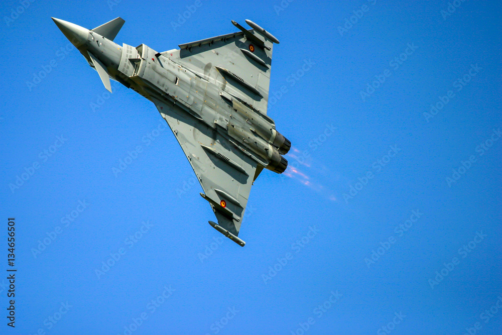 Wall Mural FAIRFORD, UK - JULY 16, 2006: Eurofighter Typhoon aircraft performs at the Royal international air tattoo in Fairford, Gloucestershire, England