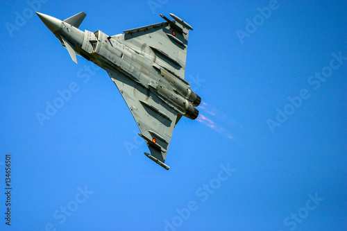 FAIRFORD, UK - JULY 16, 2006: Eurofighter Typhoon aircraft performs at the Royal international air tattoo in Fairford, Gloucestershire, England. photo