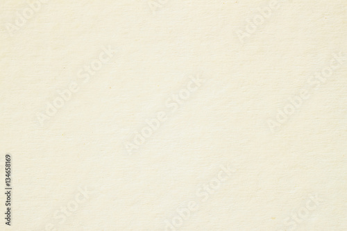 Texture of light cream paper for artwork. Background design with copy space