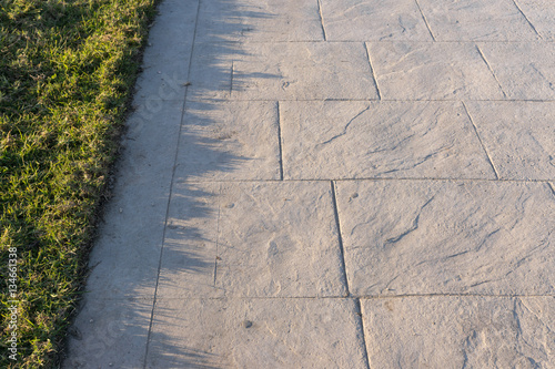 Stamped concrete pavement slate stone pattern, decorative appearance colors and textures of paving slate stone tile on cement flooring exterior decorative, perspective
