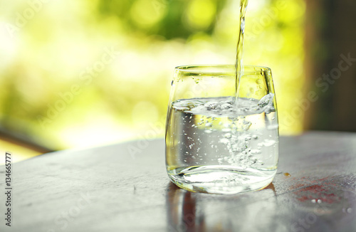 Glass of clear water on the table