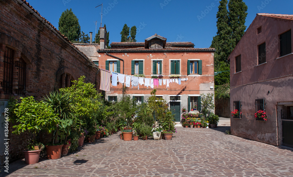 View of a small secluded piazza on Giudecca Island, Venice, Italy