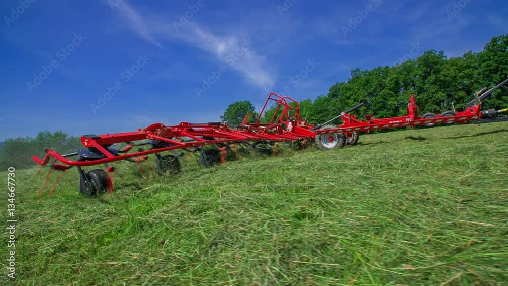 Rotary Rake Vs Wheel Rake Rotary rakes machinery is moving very fast when a farmer is driving on ...