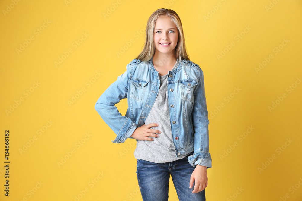 Beautiful teenager girl on yellow background Beautiful teenager girl on yellow background