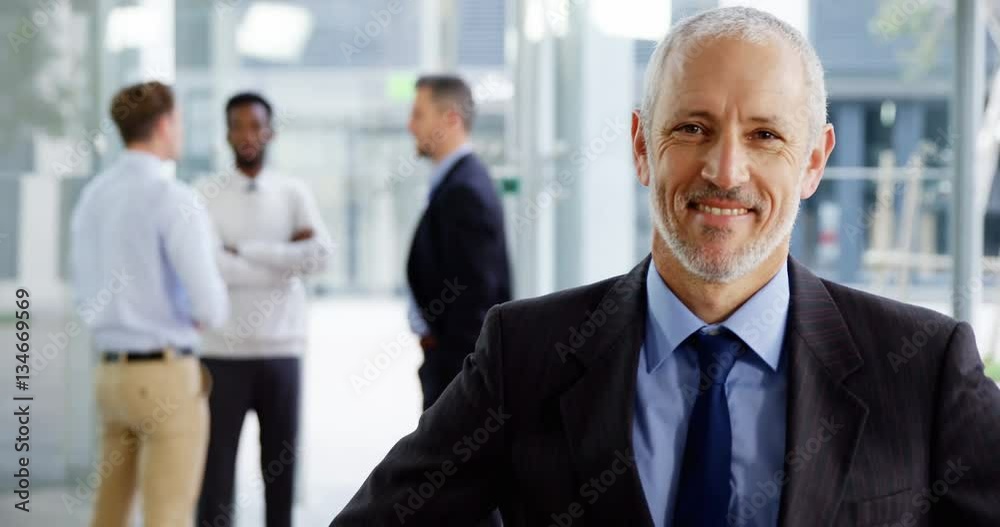 Portrait of smiling businessman in office 4k Portrait of smiling businessman in office 4k