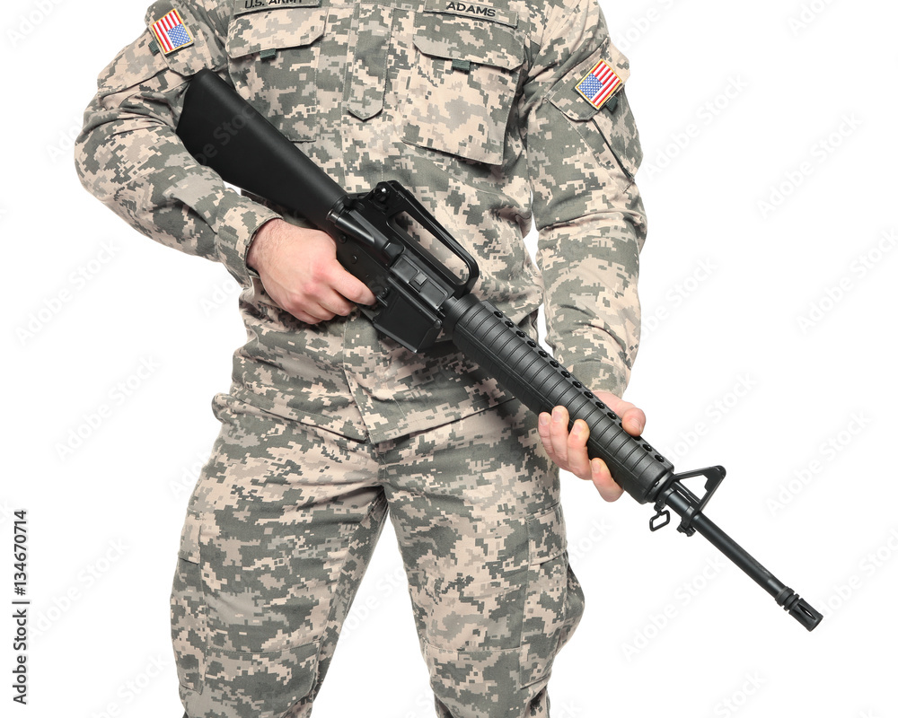 Soldier with assault riffle on white background, closeup