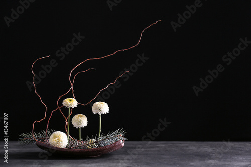 Flower arrangement on black background photo