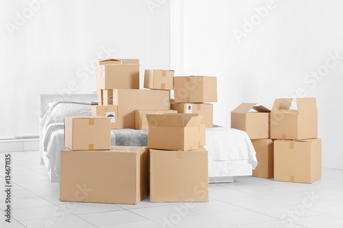 Packed household stuff for moving into new house © Africa Studio