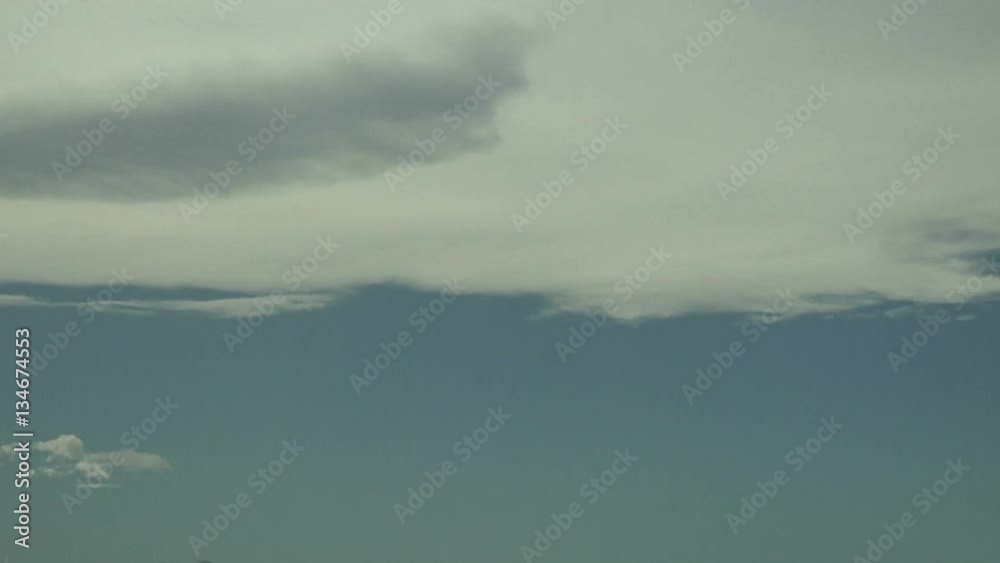 Banner Clouds Stationary as Air Flows Over Mountains