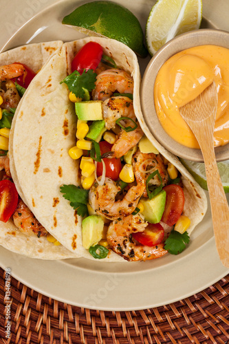 Shrimp Tacos with Corn and Avocado Salsa. Selective focus.
