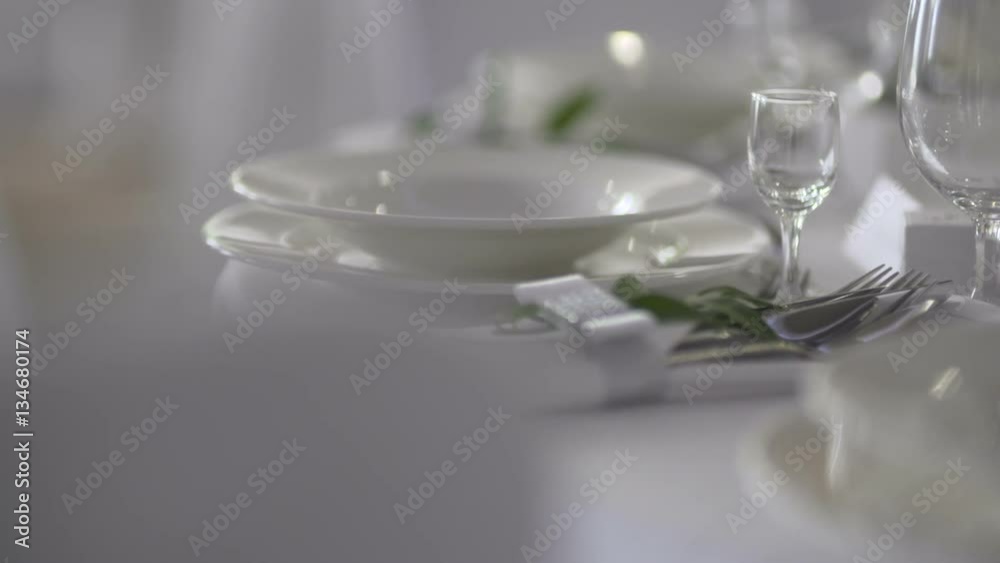 Table with wine glasses of wedding arrangement at he sunset. Table with wine glasses of wedding arrangement at he sunset.