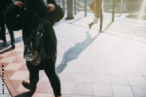 people walking in the street, (blur focus).