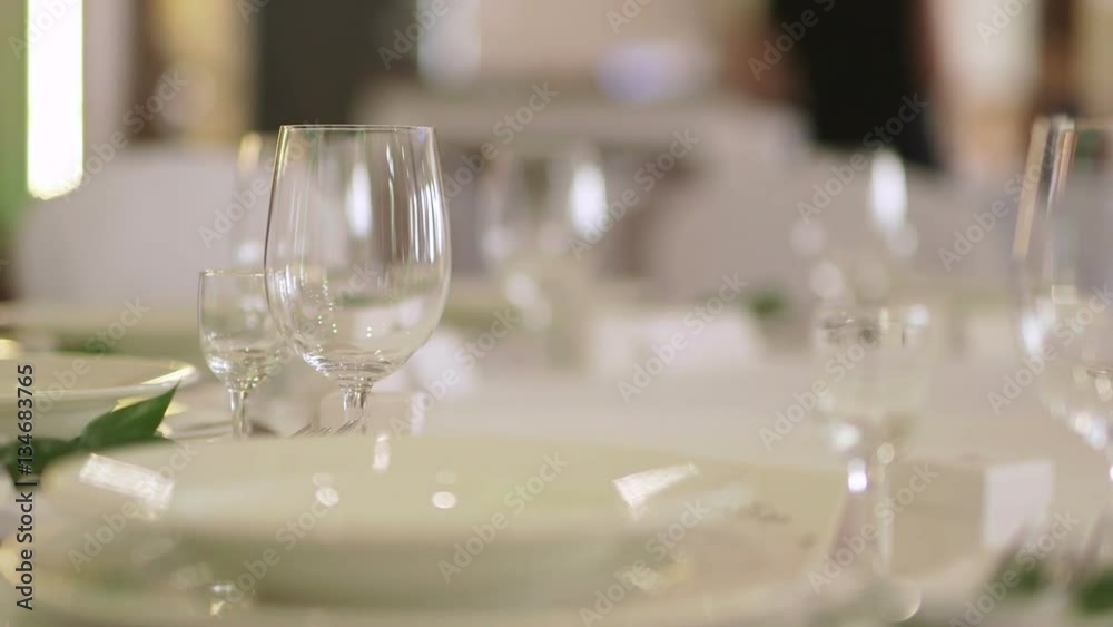 Elegant candlelight dinner table setting at reception Elegant candlelight dinner table setting at reception
